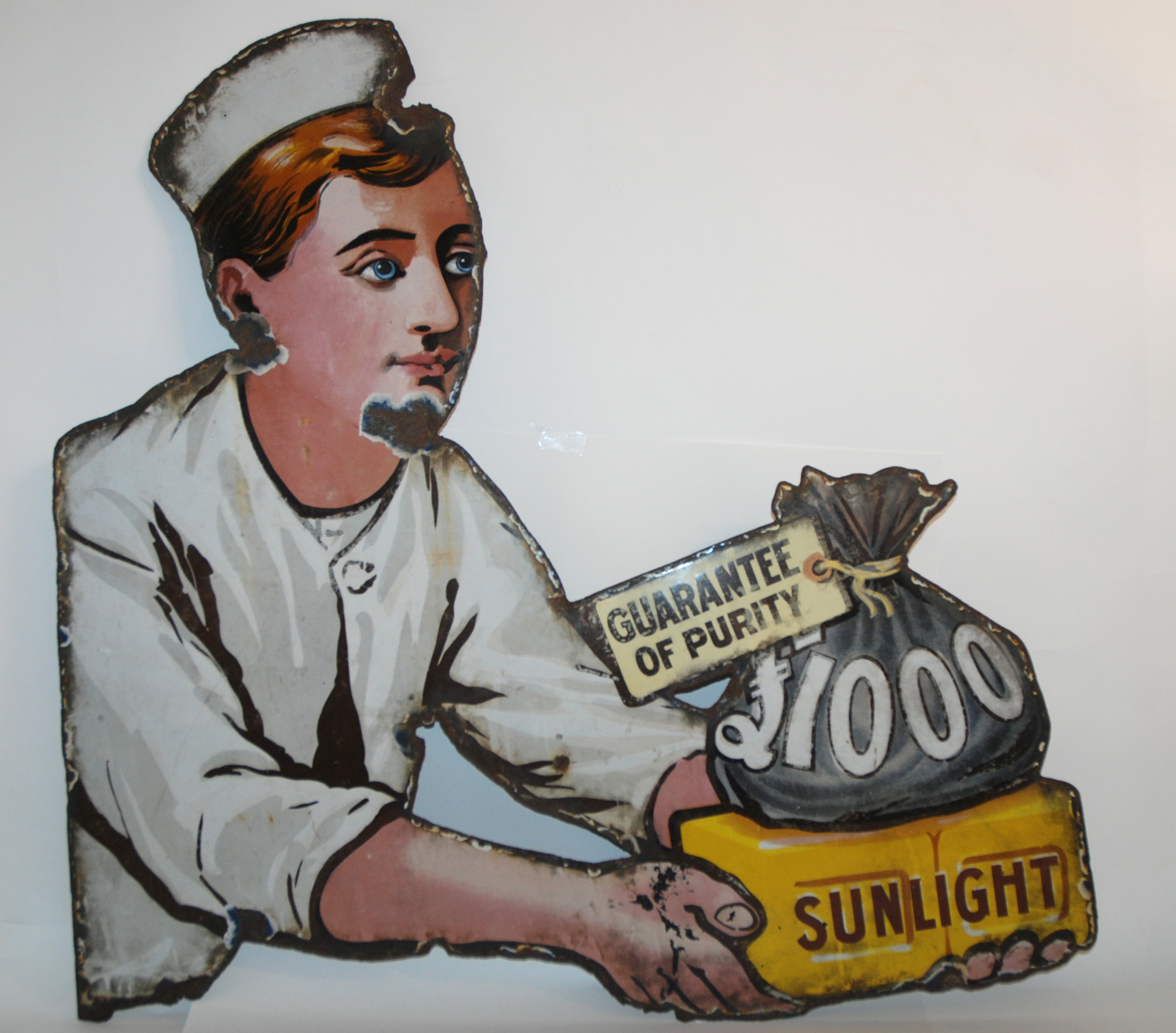 A SHAPED SUNLIGHT SOAP ENAMEL ADVERTISING SIGN with areas of wear, 80cm high x 82cm wide Condition - Image 2 of 8