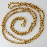 A BRIGHT YELLOW METAL FANCY GUARD CHAIN length 108cm, weight 97.4gms Condition Report: No hallmarks,
