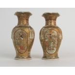 A PAIR OF SATSUMA BALUSTER VASES decorated with panels of noblemen, consort and birds, within diaper