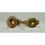 TWO VICTORIAN RINGS a yellow metal ring with reeded shoulders and set with a pale green foiled set