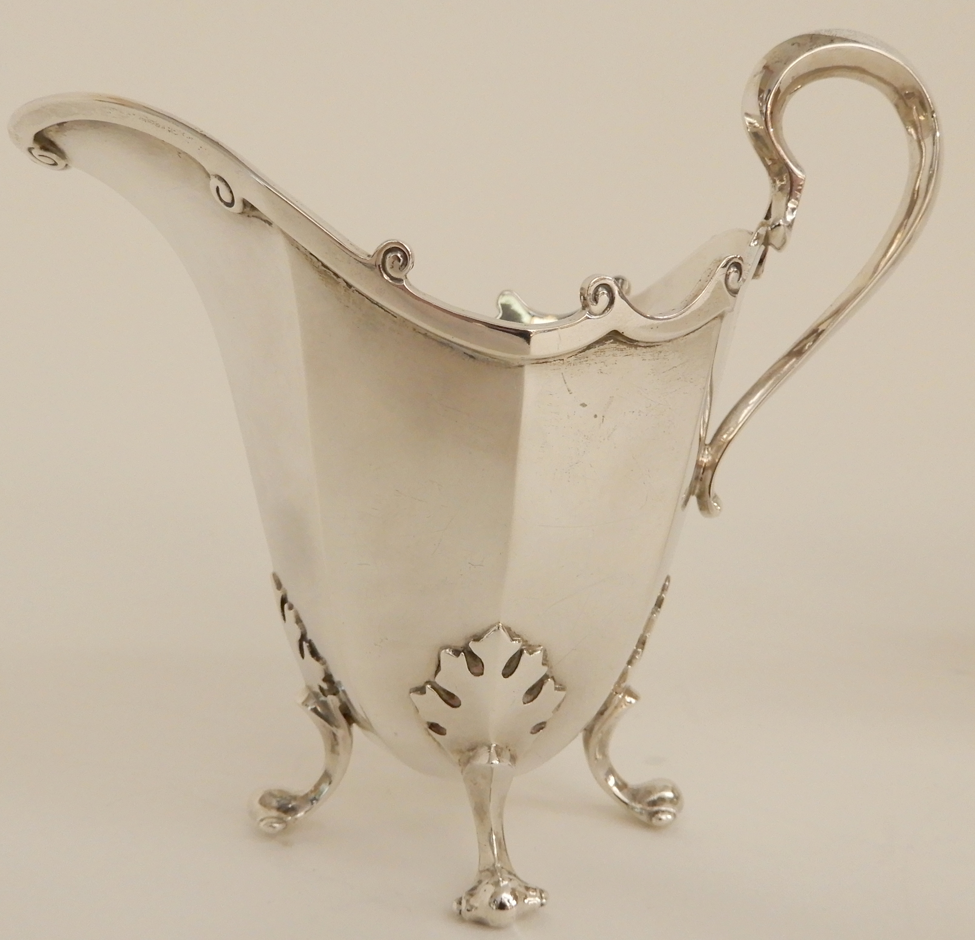 A FOUR PIECE SILVER TEA SERVICE by James Ballantyne & Son, Glasgow 1916, of faceted oval form with - Image 7 of 14