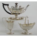 A LATE VICTORIAN FOUR PIECE SILVER TEA SERVICE by Thomas Bradsbury & Sons, London 1897 comprising;