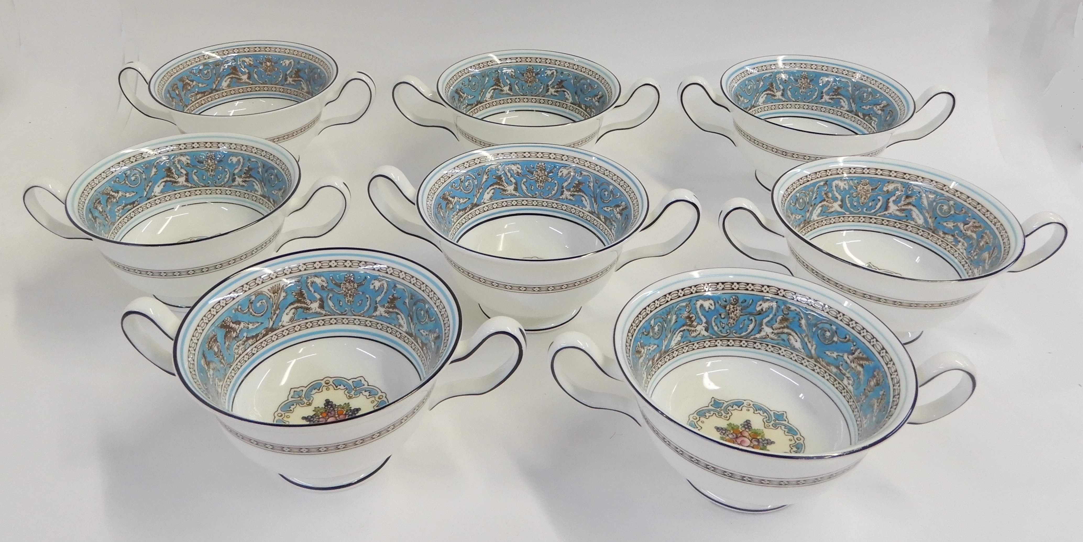 AN EXTENSIVE WEDGWOOD TURQUOISE FLORENTINE DINNER SERVICE comprising
