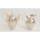 A TWO PIECE VIENNESE 800 SILVER CAFE AU LAIT SET maker's marks PD, Vienna 1867 - 1922, of ovoid form