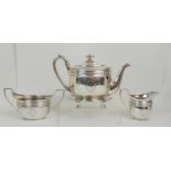 A GEORGE III SILVER FOUR PIECE TEA SERVICE maker's marks JD, Edinburgh 1802, comprising teapot