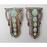 A PAIR OF ART DECO OPAL SET BROOCHES set in yellow and white metal further set with clear and red
