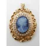 A 9CT GOLD MOULDED GLASS CAMEO AND DIAMOND PENDANT BROOCH glass cameo is approx 20mm x 15mm and