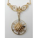 A 15CT GOLD EDWARDIAN PEARL PENDANT NECKLACE with pearl set floral motifs and star pendant brooch,