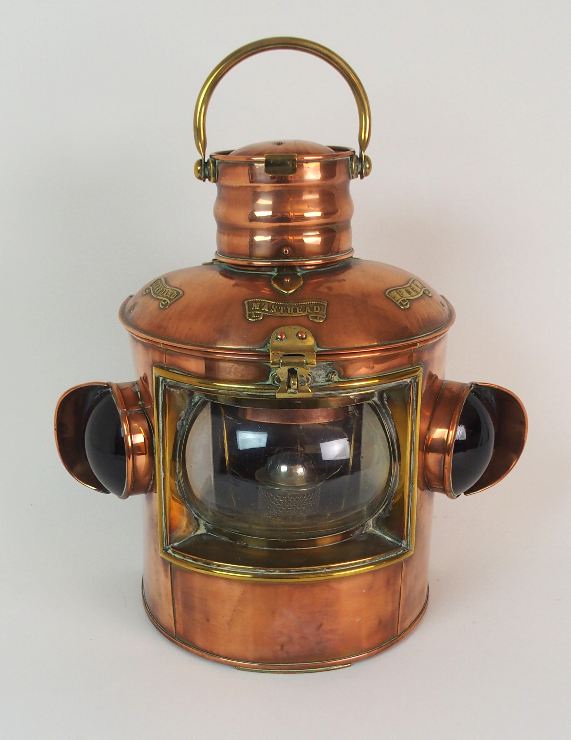 A VICTORIAN COPPER PORT & STARBOARD SHIPS LANTERN with hinged top and swing handle, with interior