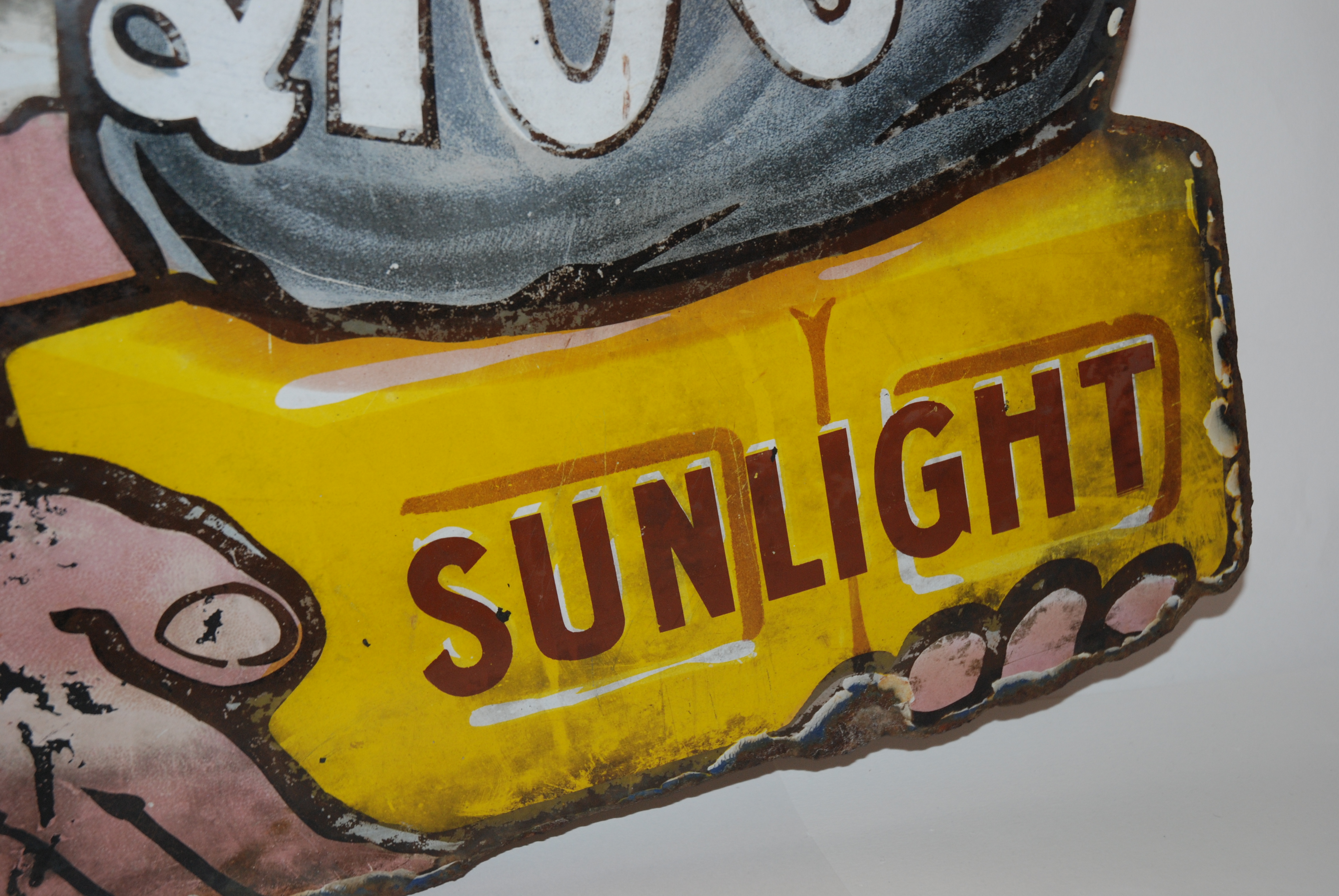A SHAPED SUNLIGHT SOAP ENAMEL ADVERTISING SIGN with areas of wear, 80cm high x 82cm wide Condition - Image 5 of 8