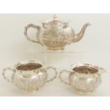 AN ASIAN, PROBABLY BURMESE THREE PIECE EXPORT SILVER TEA SERVICE (unmarked but tested silver) of