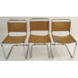 A SET OF SIX MARCEL BREUR CHROME FRAMED CHAIRS with tan leather seats and backs, 77cm high and a