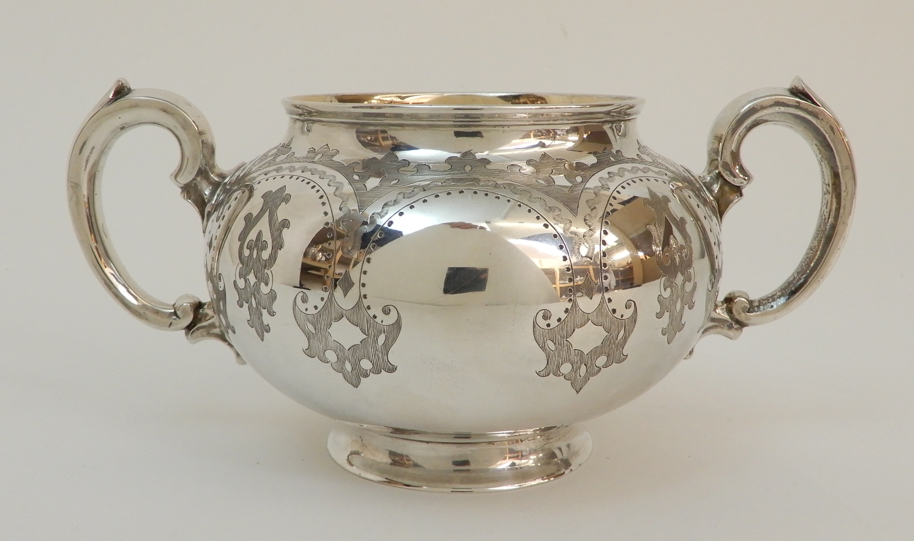 A MATCHED VICTORIAN SILVER THREE PIECE TEA SERVICE by Robert Harper, London 1867, the cream jug - Image 12 of 13