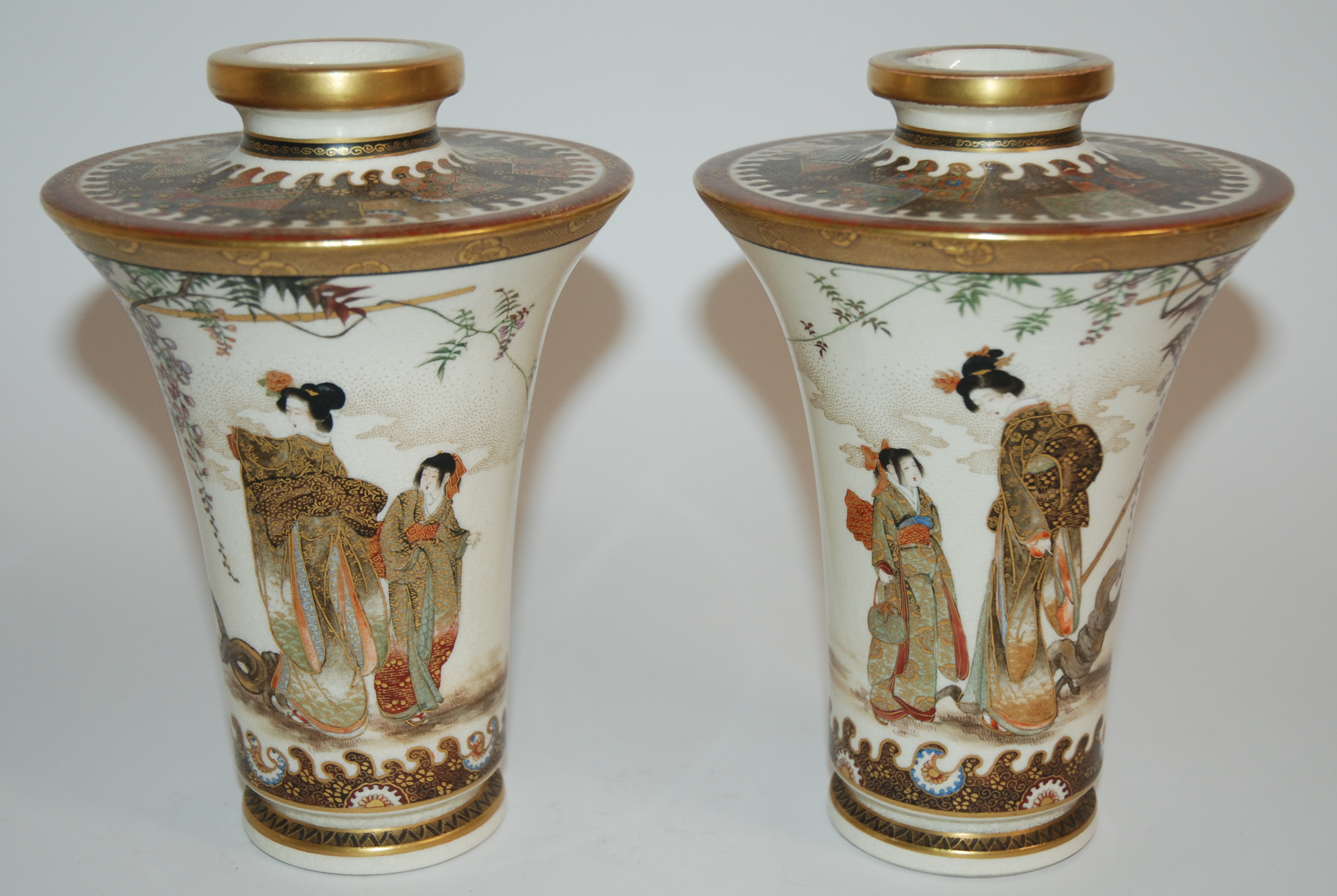 A PAIR OF SATSUMA CYLINDRICAL VASES painted with figures beneath wisteria and gilt trellis, the - Image 2 of 10