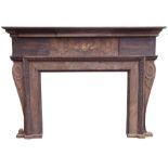 A VICTORIAN ROSEWOOD FIRE SURROUND the over-hanging cornice above an inlaid foliate panel with