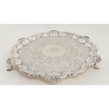 AN EDWARDIAN SILVER SALVER by Hamilton & Inches, Edinburgh 1907, of circular form with scalloped