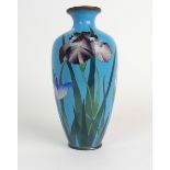 A JAPANESE CLOISONNE BALUSTER VASE decorated with tall irises on a lilac ground, 18cm high Condition