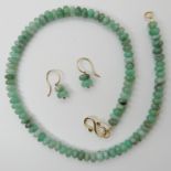 A TOM WYLIE NECKLACE AND MATCHING EARRINGS the green hardstone necklace has a yellow metal 'S'