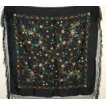 A BLACK GROUND AND EMBROIDERED PIANO SHAWL 106 x 112cm, another similar 110 x 110cm and a cream