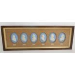 OF NAVAL INTEREST - A FRAMED SET OF SIX WEDGWOOD BLUE JASPERWARE PLAQUES each of oval shape