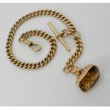 AN 18CT GOLD ALBERT CHAIN WITH SMOKY QUARTZ FOB SEAL stamped 18ct to every link, the clasp and 'T'