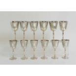 A SET OF SIX SILVER WINE GOBLETS by Charles S Green & Company Limited, Birmingham 1969, with foliate