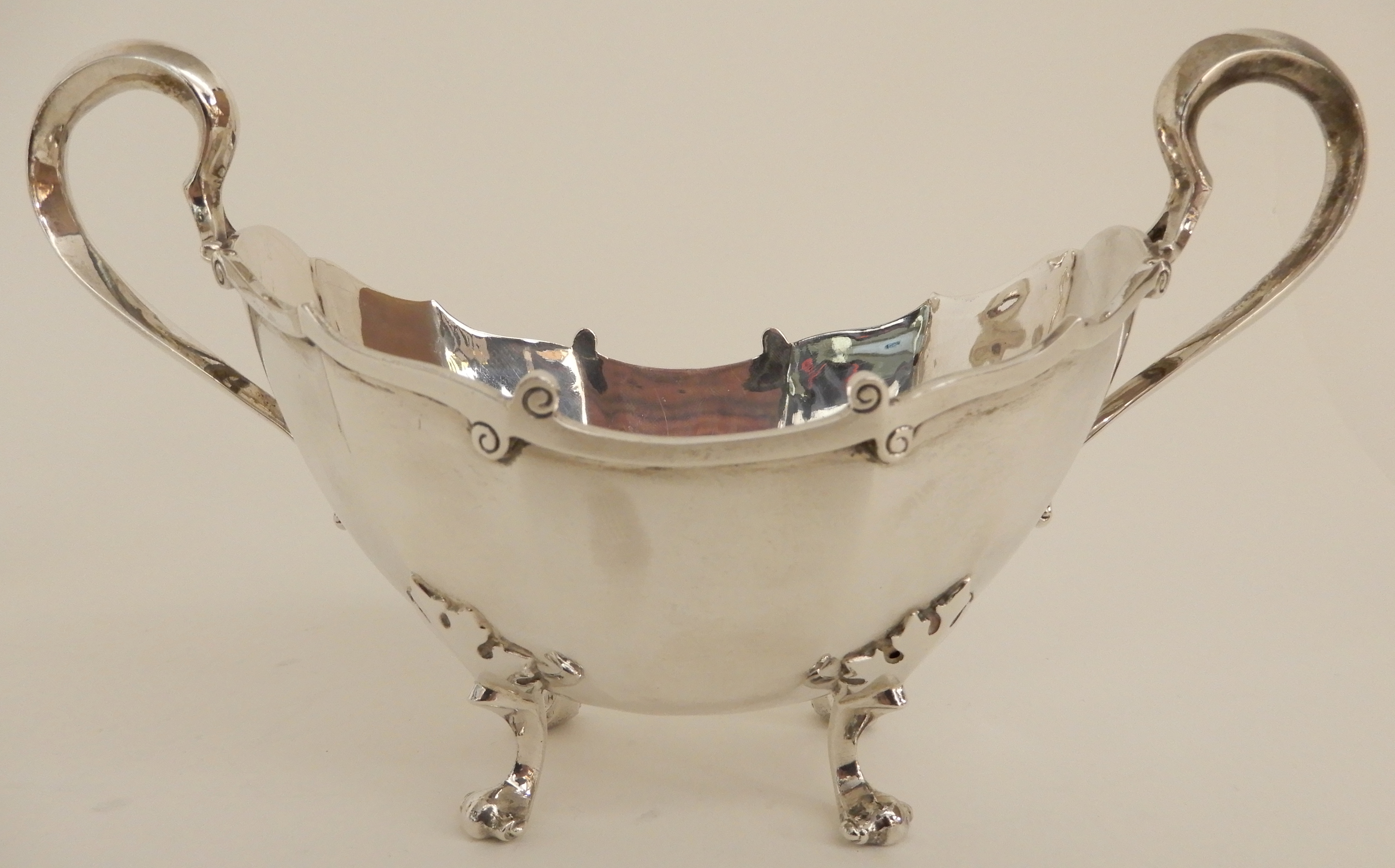 A FOUR PIECE SILVER TEA SERVICE by James Ballantyne & Son, Glasgow 1916, of faceted oval form with - Image 6 of 14