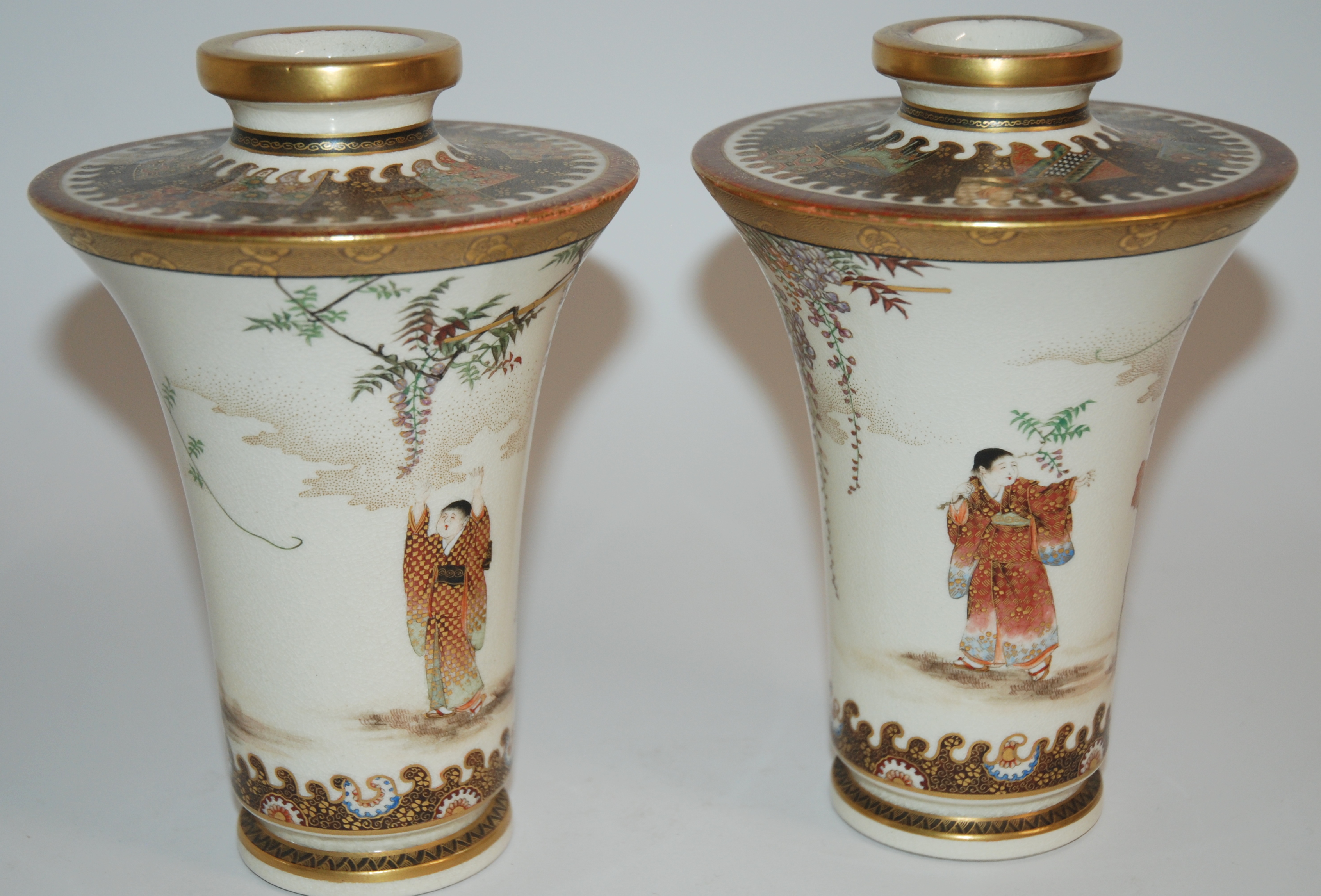 A PAIR OF SATSUMA CYLINDRICAL VASES painted with figures beneath wisteria and gilt trellis, the - Image 5 of 10