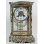A FRENCH CHAMPLEVE ENAMEL MANTLE CLOCK the dial with white enamelled chapter ring and Arabic
