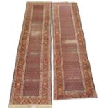 TWO BLUE GROUND ARAAK RUNNERS with cream and rust borders, 393cm x 98cm (2) Condition Report: