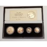 A 1985 UNITED KINGDOM GOLD FOUR-COIN PROOF SET £5, £2, full sovereign and half sovereign (with