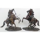 AFTER GUILLAUME COUSTOU THE ELDER late 19th century, a pair of brown patinated Marly Horses,