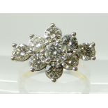 A DIAMOND CLUSTER RING of estimated approx two carats in total, with a Henderson the Jewellers
