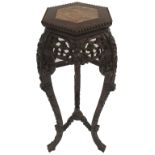 A CHINESE HEXAGONAL FLORAL CARVED HARDWOOD PLANT PEDESTAL with marble top, 90cm high Condition
