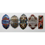 FIVE VINTAGE ENAMELLED BASE METAL BUCKLES a Japanese cloisonne buckle, featuring mount Fuji, yin