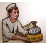 A SHAPED SUNLIGHT SOAP ENAMEL ADVERTISING SIGN with areas of wear, 80cm high x 82cm wide Condition