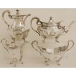 A FOUR PIECE SILVER TEA SERVICE by James Ballantyne & Son, Glasgow 1916, of faceted oval form with