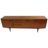 A GREAVES SAND THOMAS TEAK SIDEBOARD with three drawers, drop front door flanked by two doors on a