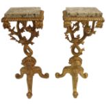 A PAIR OF MODERN GILT RUSTIC PEDESTALS with marble tops, the stems as sinuous