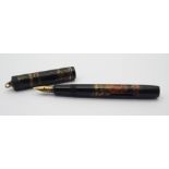 A DUNHILL NAMIKI LEVER-FILL FOUNTAIN PEN black lacquer decoration with butterflies and peonies,