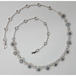 A 14K WHITE GOLD, BLUE AND WHITE DIAMOND NECKLACE the blue diamonds are estimated approx at 0.