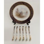 A JAMES STINTON ROYAL WORCESTER PLATE circa 1908, painted with a male and female pheasant in a