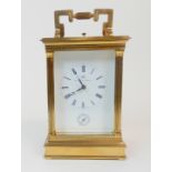 A FINE 20TH CENTURY BRASS-CASED REPEATER CARRIAGE CLOCK the white enamel dial with Roman numerals