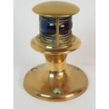 A SQUAT BRASS PORT & STARBOARD LIGHT on turned wooden base, light 16cm high, overall 22cm