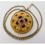 A BRIGHT YELLOW METAL VICTORIAN LOCKET BACK BROOCH set with amethysts and other gems in foiled