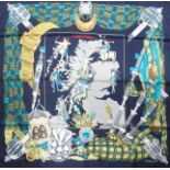 A HERMES BLUE GROUND SILK SCOTLAND SCARF designed by Philippe Ledoux, 89 x 89cm, in original box