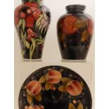 A MOORCROFT POMEGRANATE PLATE 18cm diameter, a Moorcroft Pomegranate vase, 16.5cm high and a