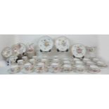 AN EXTENSIVE MATCHED DRESDEN TEA AND COFFEE SERVICE comprising thirteen teacups, eleven coffee cups,
