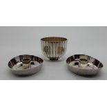 A lot comprising a pair of Georg Jensen sterling silver candle holders, 5cm diameter and a Georg