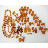 A collection of amber coloured bead jewellery, total weight 172.4gms (af) Condition Report: Not